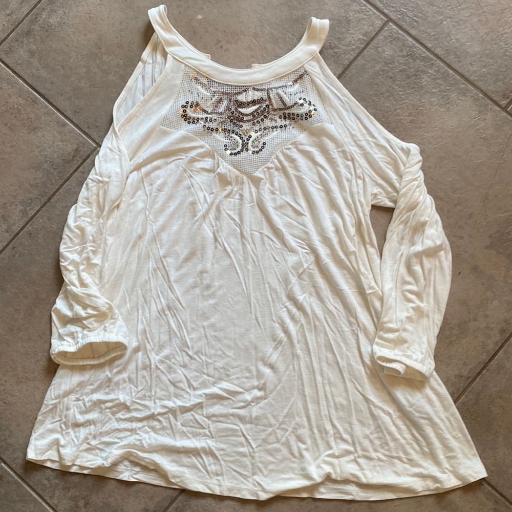 Cold shoulder flared top with sequin front design